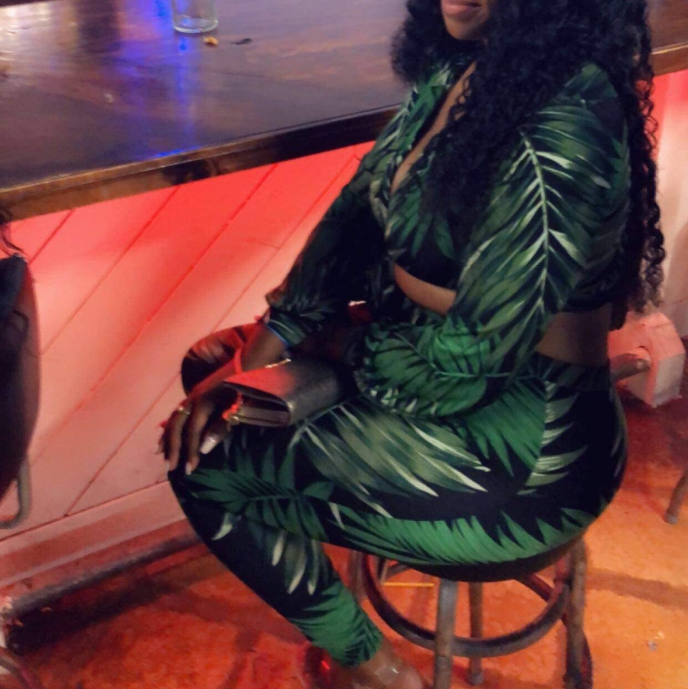 Black and green 2 piece outfit.